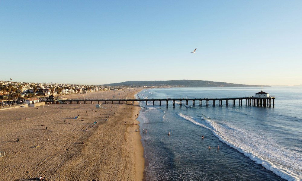 Residents on a South Bay beach in Los Angeles County